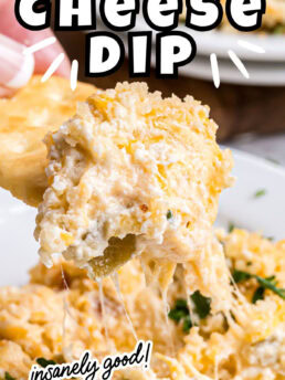 hot cheesy dip on a cracker