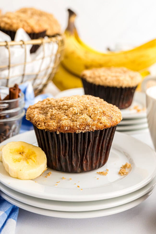 banana crumb muffin in a dark brown wrapper