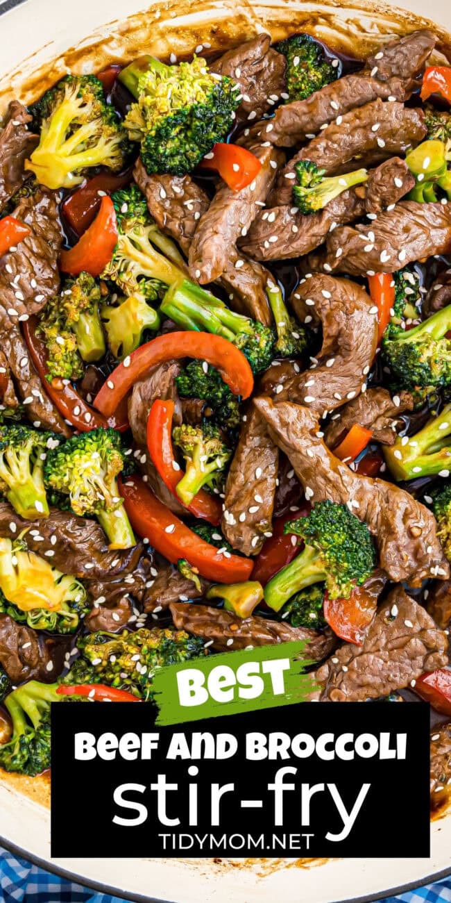 beef and broccoli with bell peppers in a pan