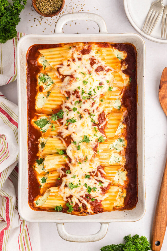 manicotti in a white baking dish