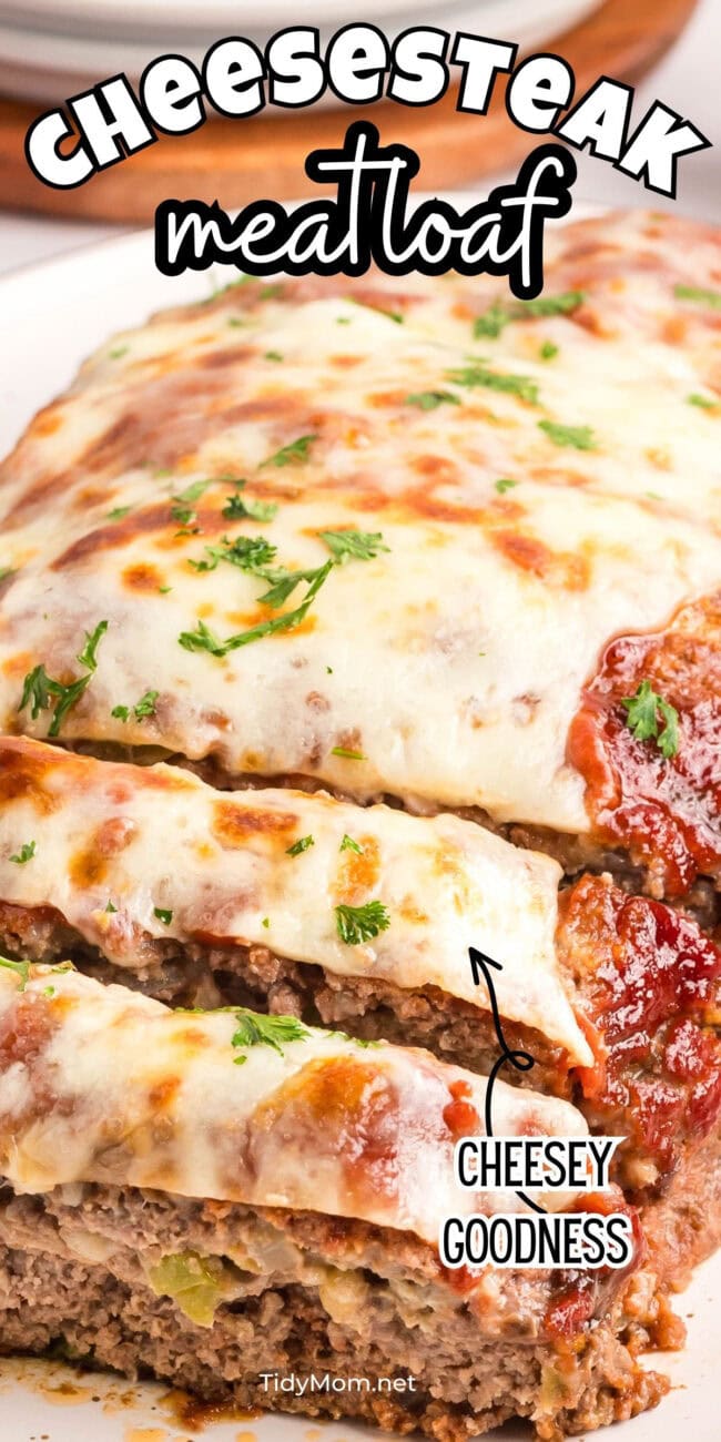 sliced cheesy meatloaf on a plate