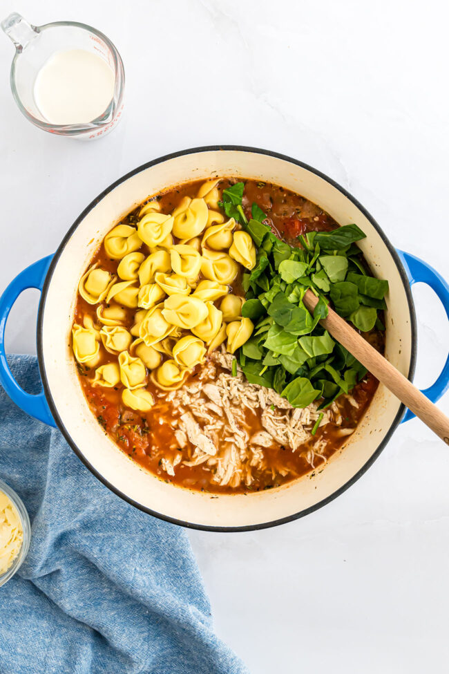 making soup with tortellini