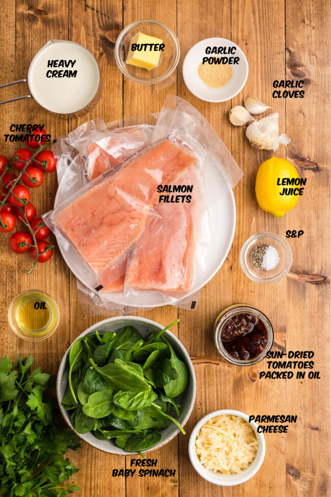 ingredients for creamy tuscan salmon on a counter