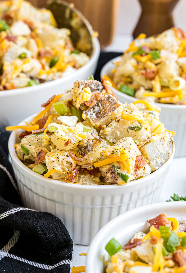 small bowls with servings of Loaded Baked Potato Salad