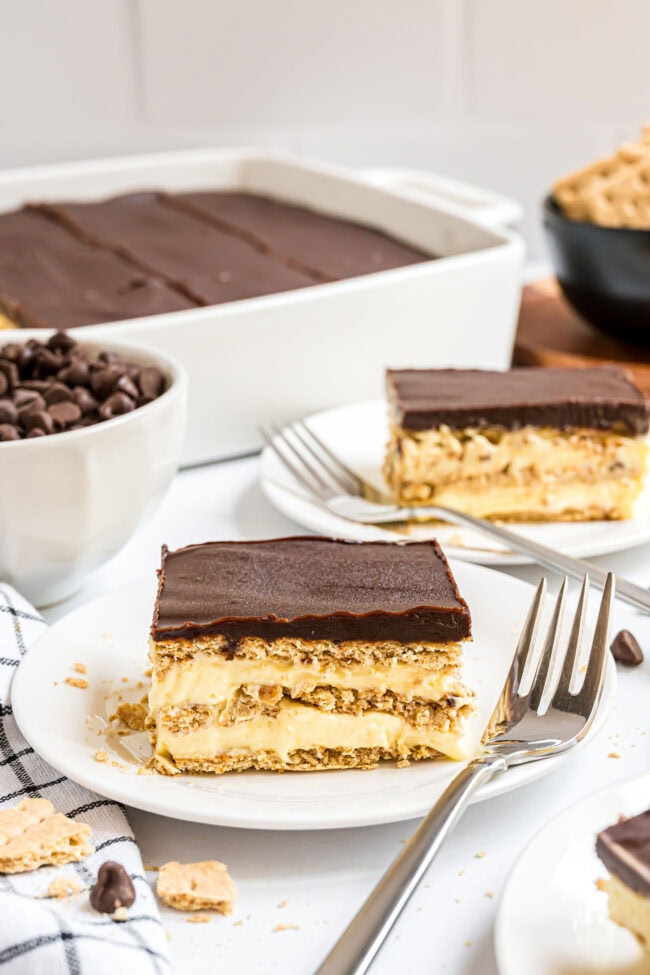 serving of chocolate eclair cake on a plate with a fork
