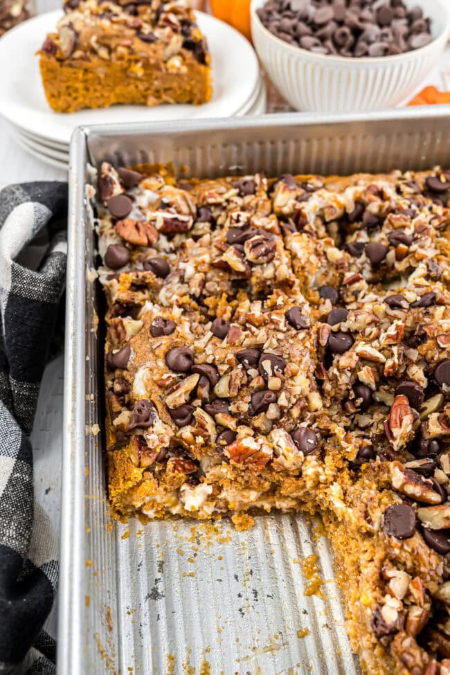 Pumpkin Earthquake dessert in a baking pan with a few servings gone