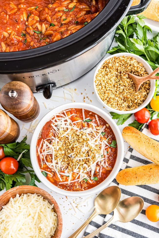 Chicken Parmesan Soup showing tender chicken, pasta, and rich tomato broth.