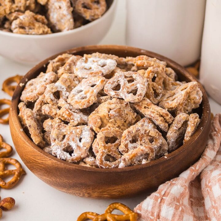 Peanut Butter Pretzel Snack Mix ready to enjoy in a wood bowl