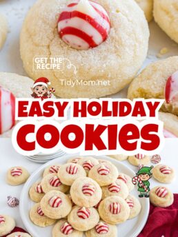 Overhead photo of Candy Cane Kiss Cookies on counter, showing sugar-coated cookies topped with striped peppermint Hershey’s Kisses.