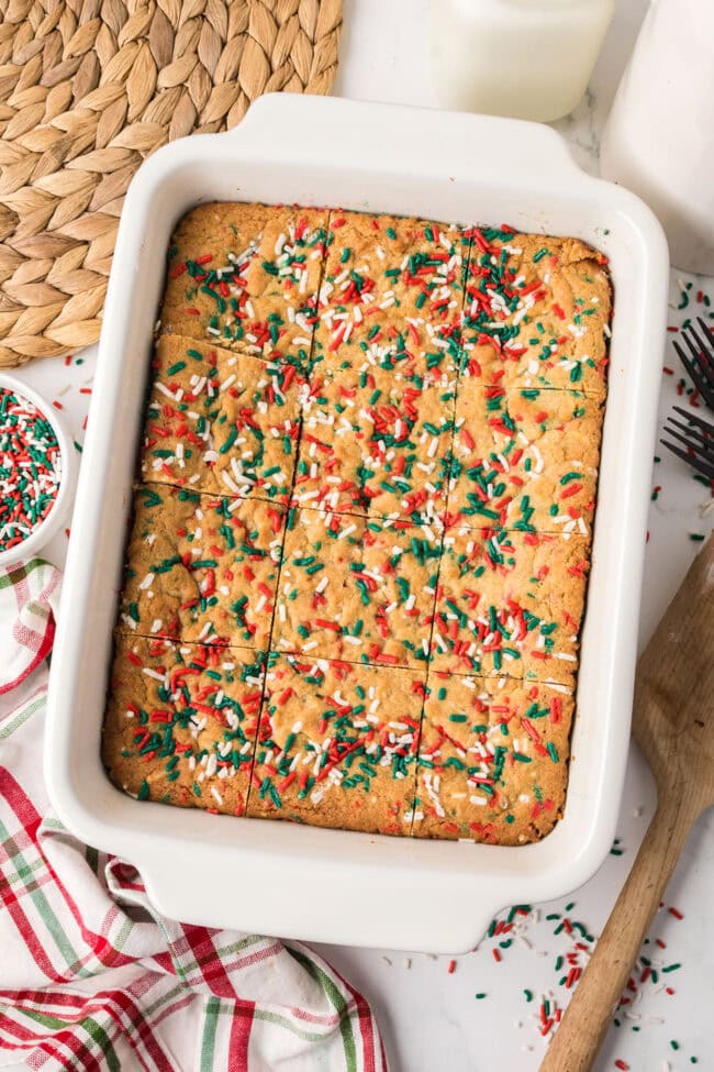 Freshly baked Christmas Blondies sliced in the pan.