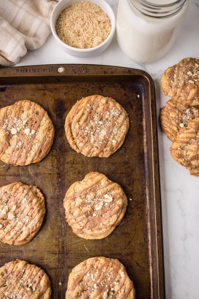 Bakery-style brown sugar cinnamon cookies with cinnamon icing drizzle