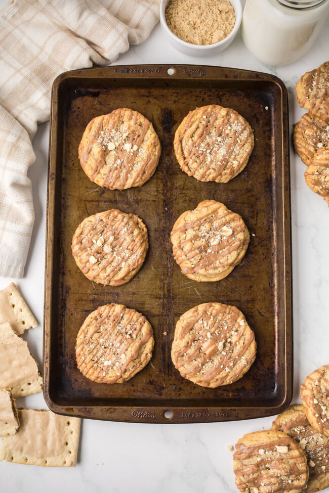 Cinnamon icing drizzled over cookies