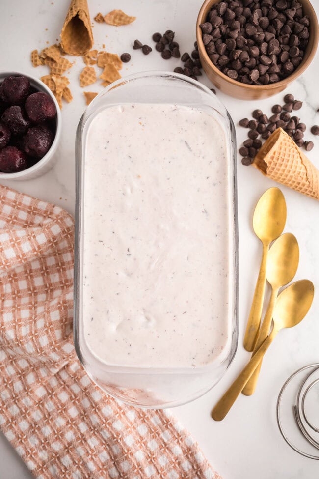 Cherry Garcia ice cream mixture in loaf pan ready to freeze