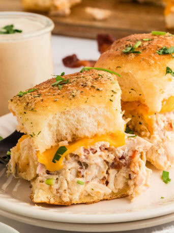 2 sliders plated with ranch dressing for dipping