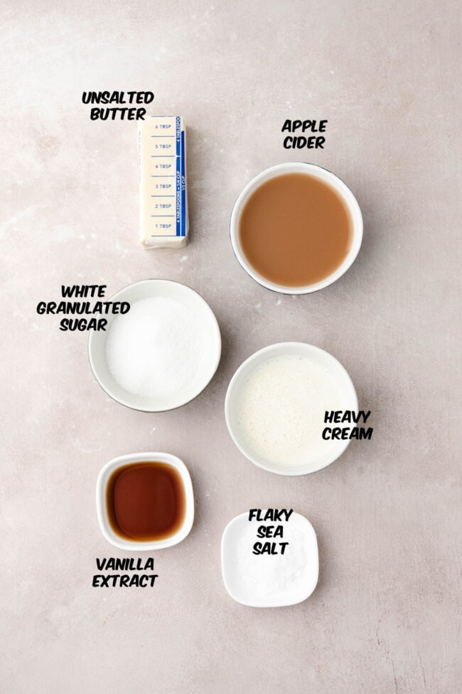 Ingredients for making homemade salted apple cider caramel sauce.