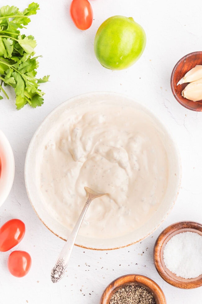 Creamy Southwest sauce made with sour cream, mayonnaise, chipotle peppers, garlic, lime juice, honey, and seasonings.
