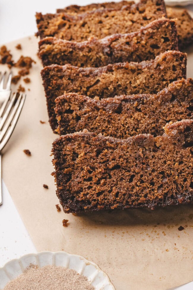 moist-apple-cider-bread sliced on a cutting board
