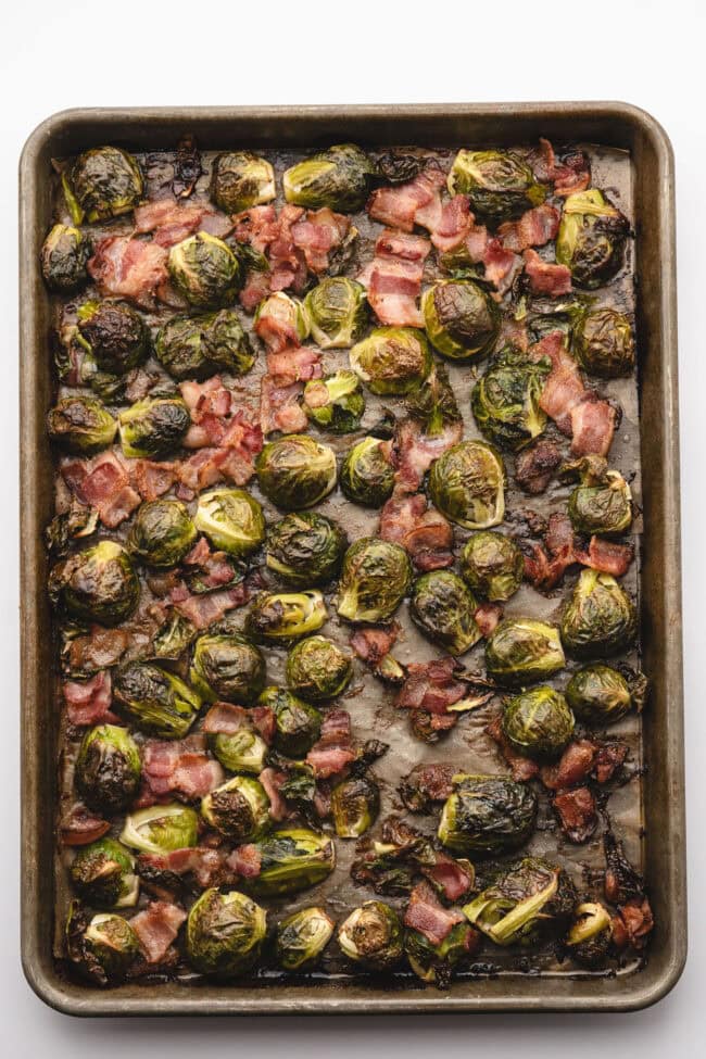 Roasted vegetables and bacon with golden caramelized edges