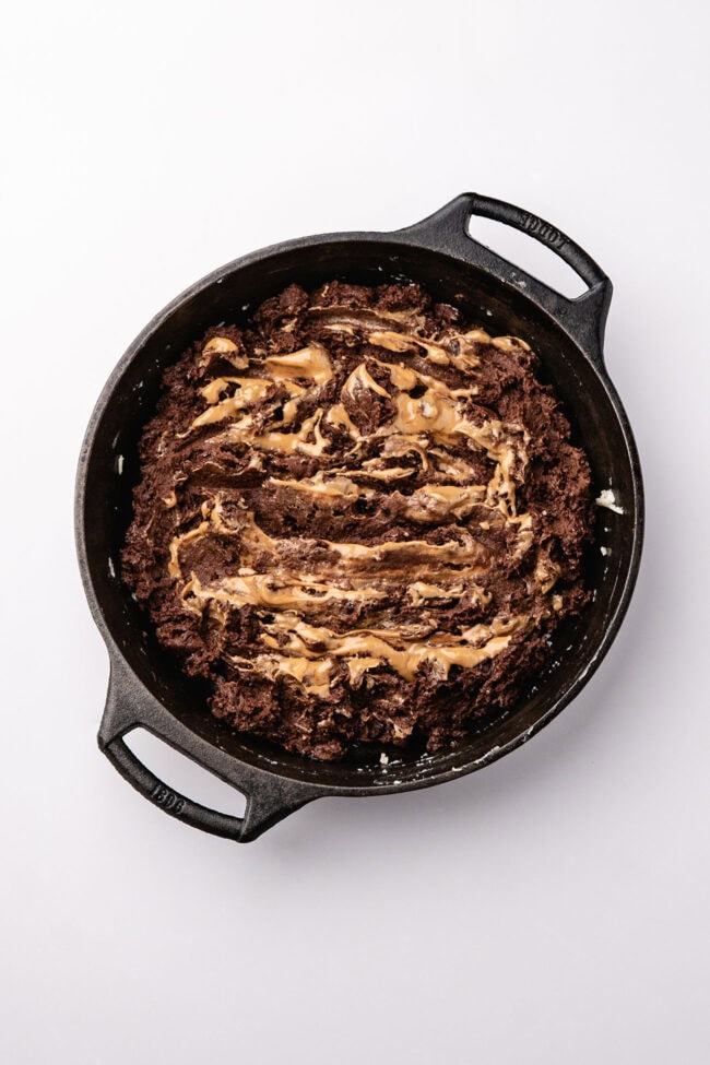 Peanut butter swirled through chocolate cobbler batter
