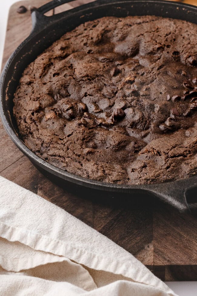 Close-up of baked chocolate cobbler in a cast-iron skillet