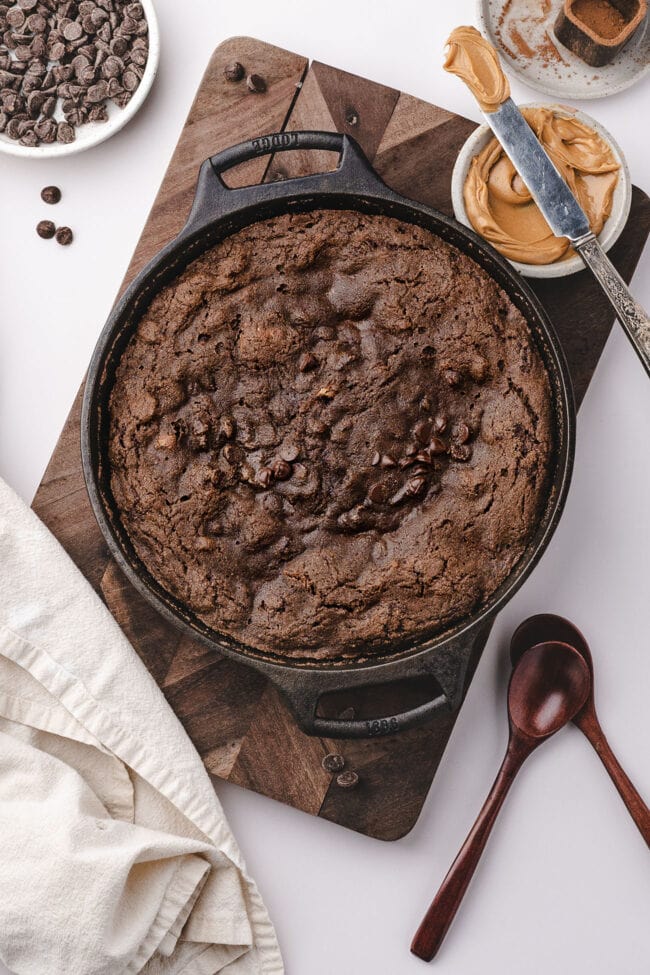 Overhead view of baked chocolate cobbler in a skillet