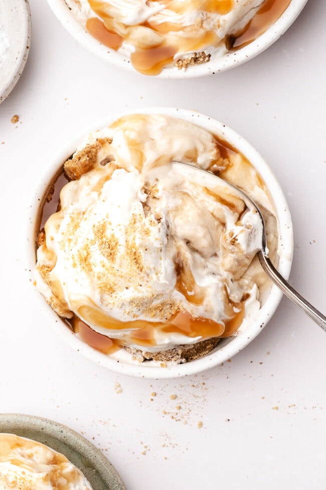 Overhead view of salted caramel scoopable cheesecake served in a dessert bowl